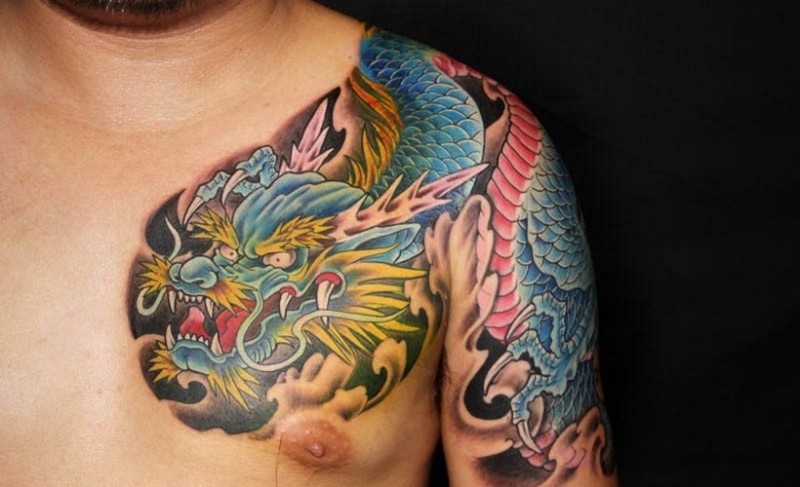 Colorful Traditional Chinese Dragon Tattoo On Man Left Shoulder And Chest