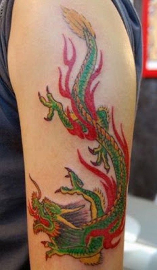Colorful Traditional Dragon Tattoo On Half Sleeve