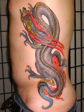 Colorful Traditional Dragon Tattoo On Left Side Rib