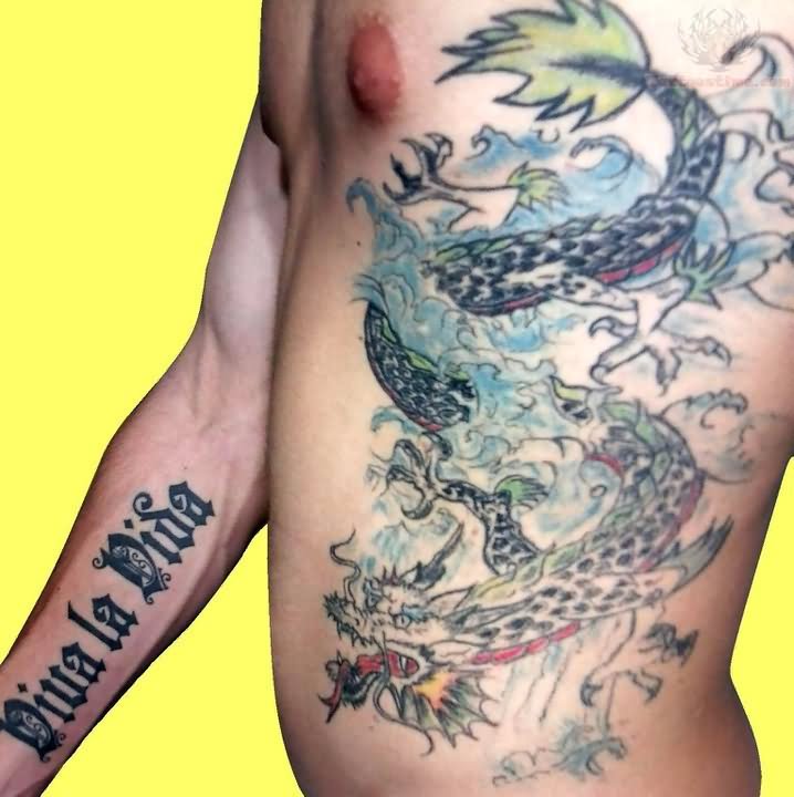 Colorful Traditional Dragon Tattoo On Man Left Side Rib