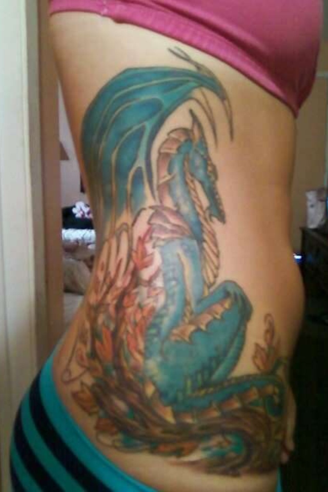 Colorful Traditional Dragon Tattoo On Right Side Rib