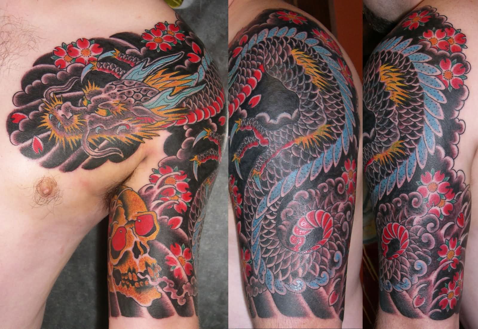 Colorful Traditional Dragon With Skull And Flowers Tattoo On Left Half Sleeve And Front Shoulder