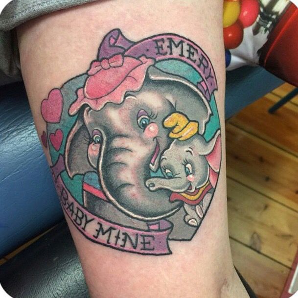 Colorful Traditional Dumbo With Mother And Banner Tattoo On Thigh