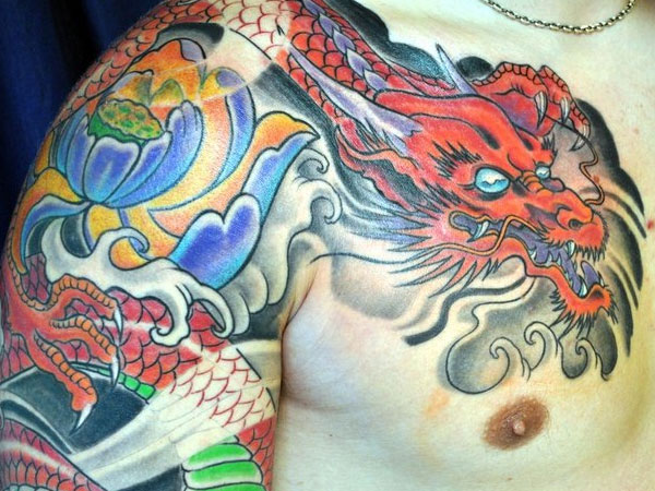Colorful Traditional Japanese  Dragon With Flower Tattoo On Right Shoulder