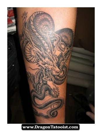 Cool Black Ink Dragon Tattoo Design For Forearm