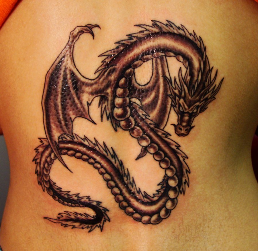 Cool Black Ink Dragon Tattoo On Man Full Back