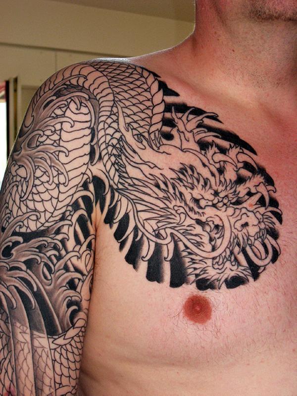Cool Black Ink Dragon Tattoo On Man Right Shoulder