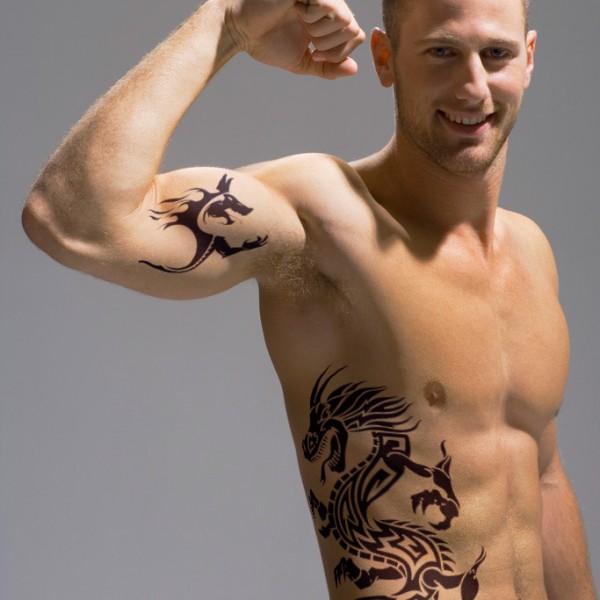 Cool Black Tribal Dragon Tattoo On Man Right Side Rib