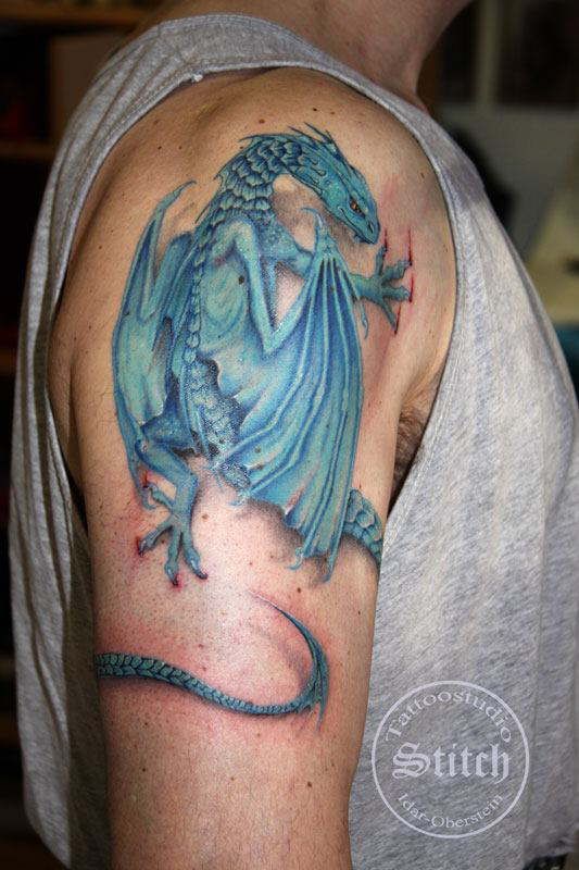 Cool Blue Ink Dragon Tattoo On Right Shoulder