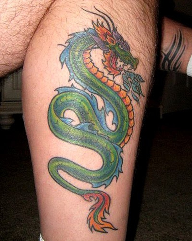 Cool Colorful Dragon Tattoo On Right Leg Calf