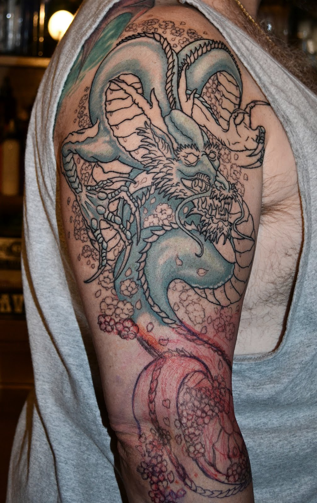 Cool Dragon Tattoo On Man Right Half Sleeve