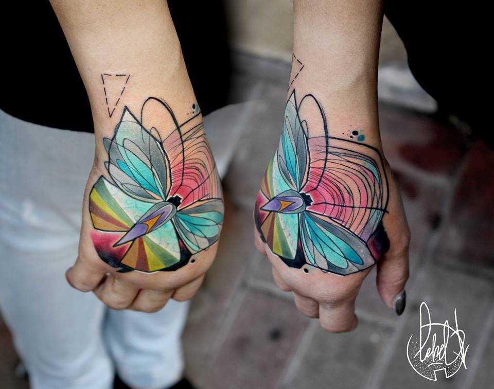 Cool Flying Butterfly Tattoo On Right Hand By Lehel Nyeste