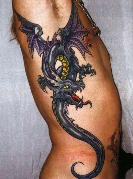 Cool Flying Dragon Tattoo On Man Right Side Rib