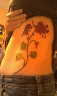 Cool Geranium Flowers Tattoo On Girl Left Side Rib
