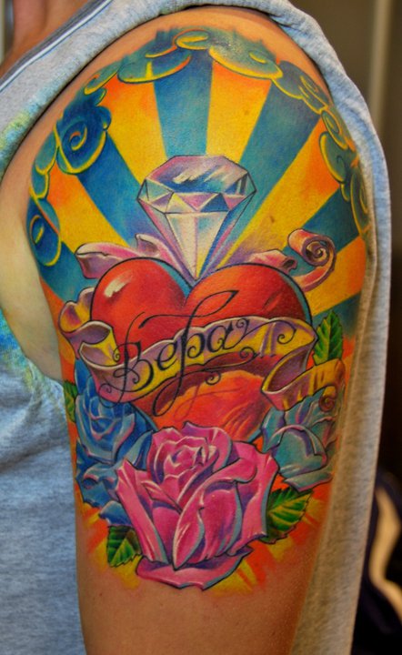 Cool Heart With Rose And Banner Tattoo On Left Half Sleeve