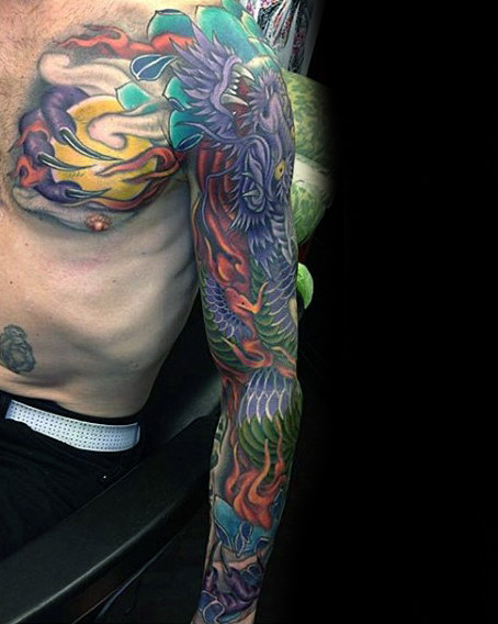 Cool Traditional Dragon Tattoo On Man Left Full Sleeve