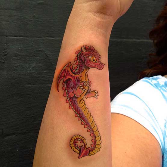 Cool Traditional Dragon Tattoo On Right Forearm
