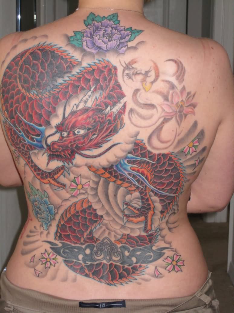 Cool Traditional Dragon With Flowers Tattoo On Full Back