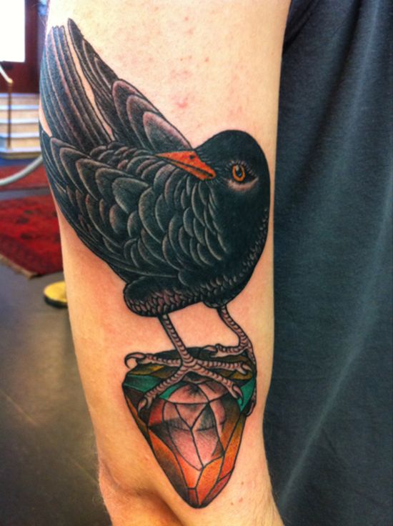 Crow Holding Diamond Tattoo On Right Bicep