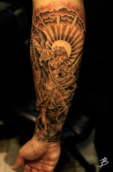 Cute Black Ink Archangel Michael Tattoo On Left Forearm