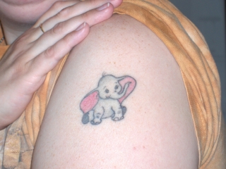 Cute Dumbo Tattoo On Left Shoulder