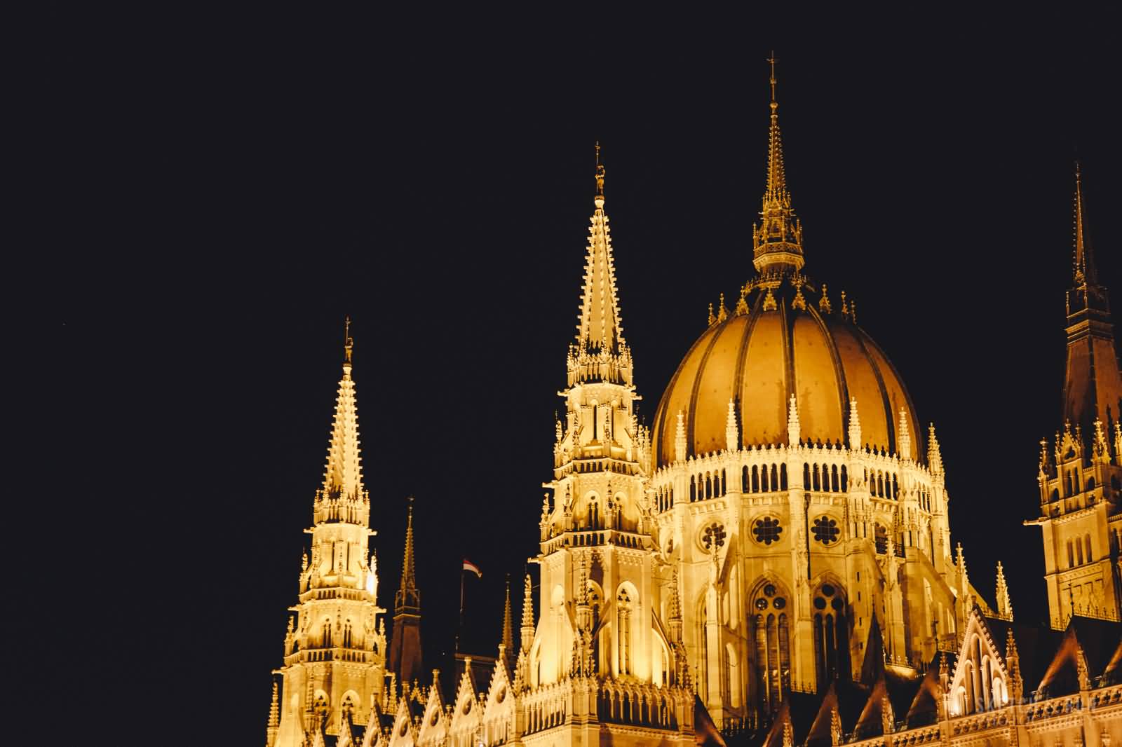 Dome And Towers Of Hungarian Parliament Building At Night