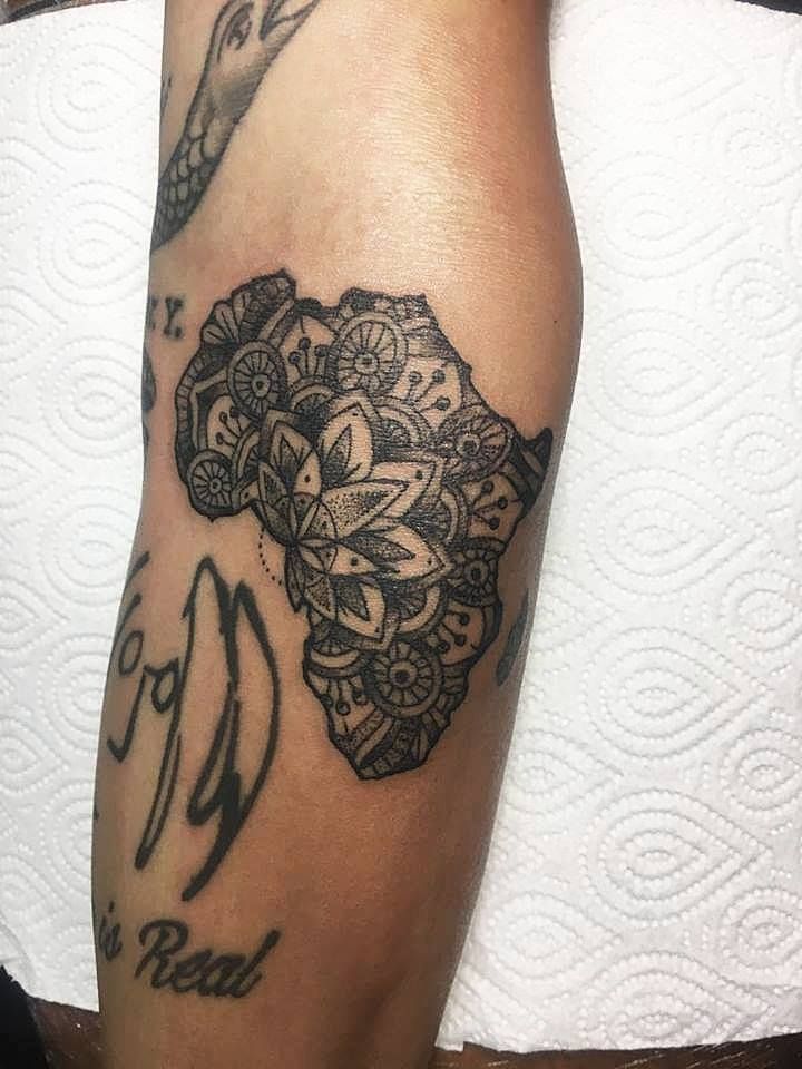 Dotwork Flowers In Africa Map Tattoo On Forearm