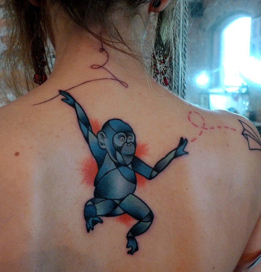 Geometric Monkey Tattoo On Women Upper Back By Mariusz Trubisz