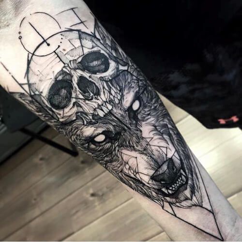 Geometric Skull And Wolf Head Tattoo On Forearm