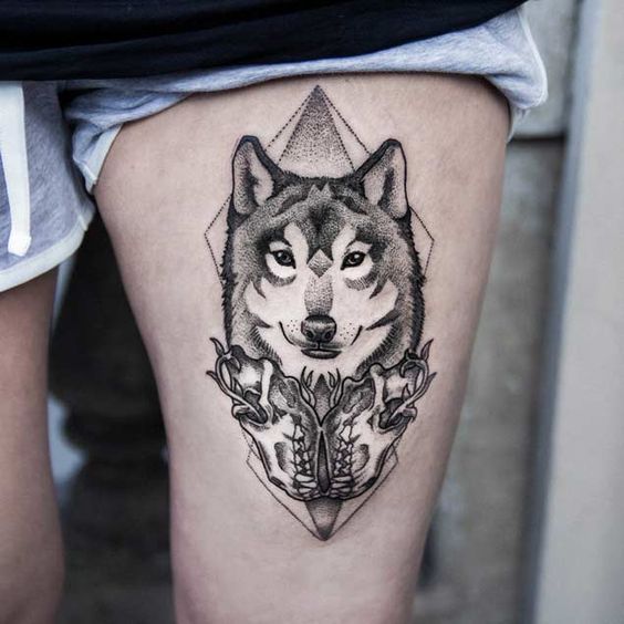 Geometric Wolf Head Tattoo On Left Thigh