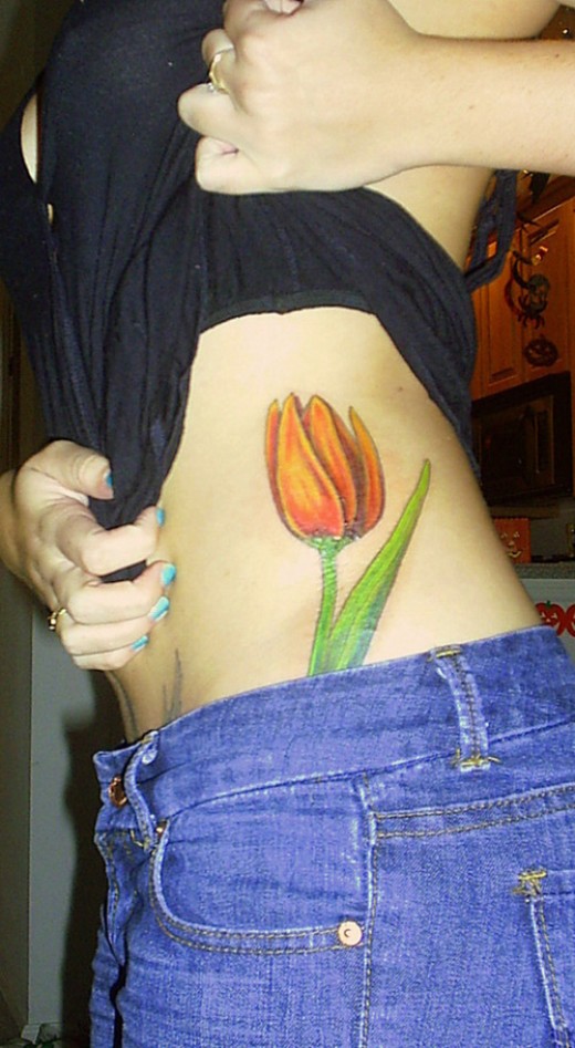 Girl Side Rib Tulip Tattoo For Girls