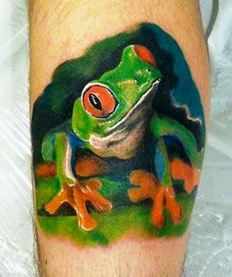 Green And Black Ink Frog Tattoo On Side Leg
