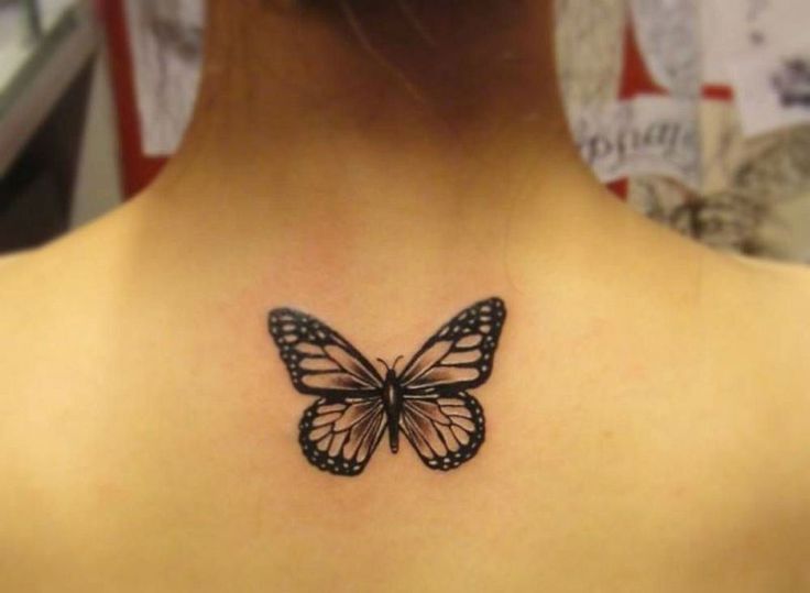 Grey And Black Butterfly Tattoo On Girl Upper Back