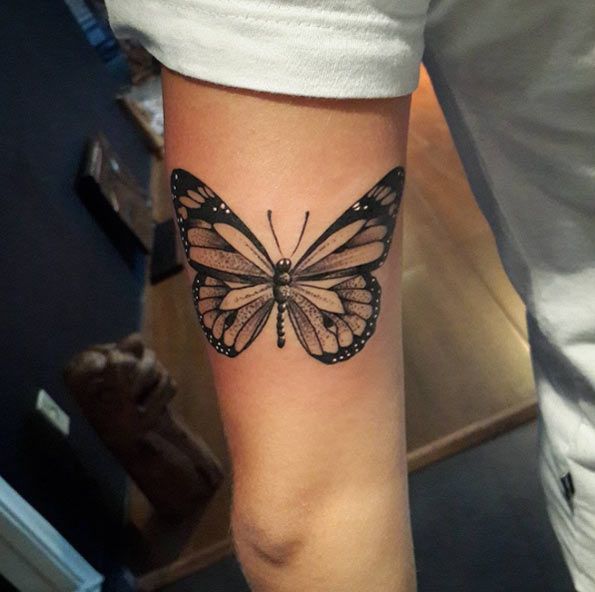 Grey And Black Butterfly Tattoo On Leg