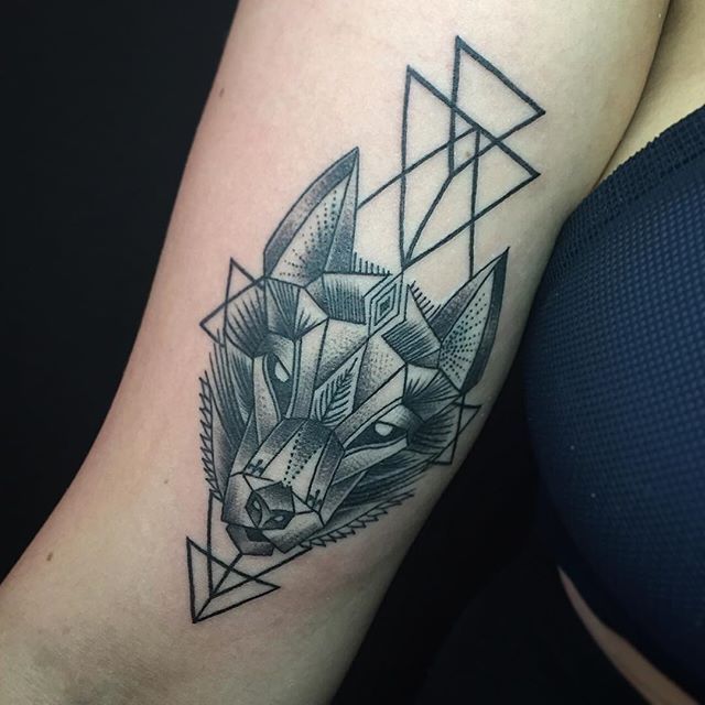 Grey And Black Geometric Wolf Head Tattoo