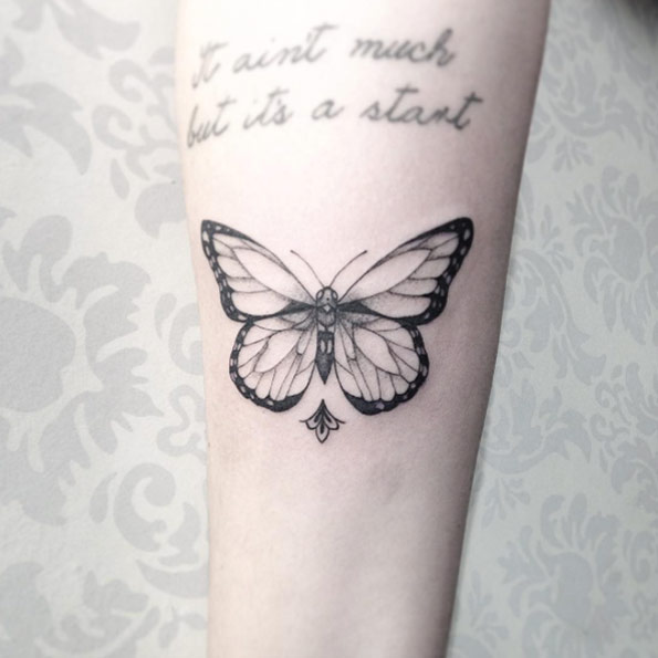 Grey Butterfly Tattoo On Forearm