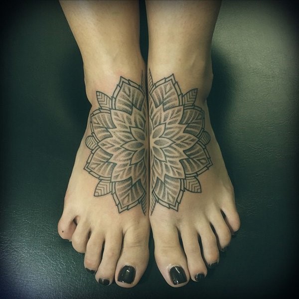Grey Ink Mandala Flower Tattoo On Feet