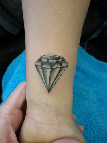 Grey Ink Small Diamond Tattoo On Forearm