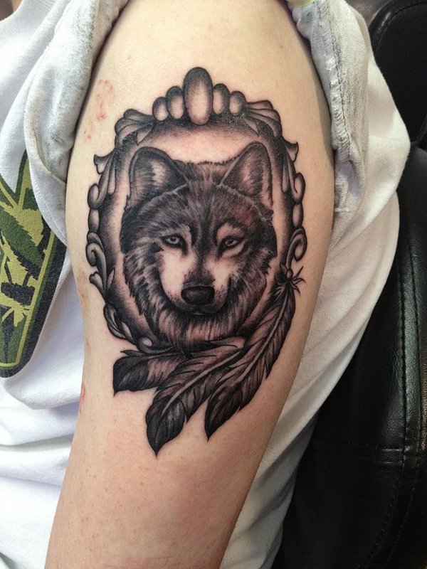 Grey Wolf Head In Mirror Tattoo On Left Bicep