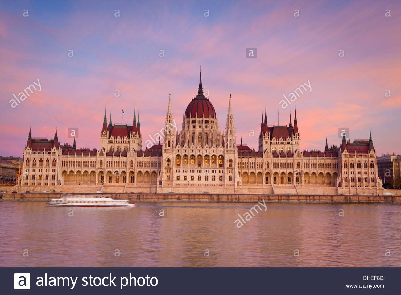 Hungarian Parliament Building And River Danube At Sunset