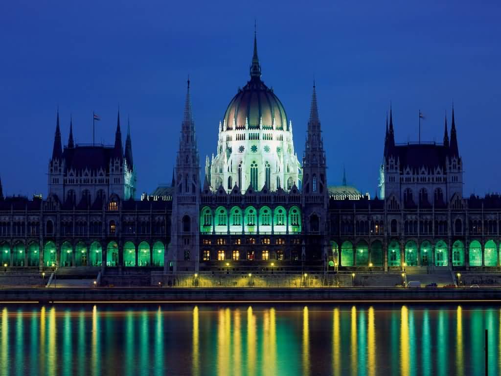 Hungarian Parliament Building Lit Up By Night In Budapest