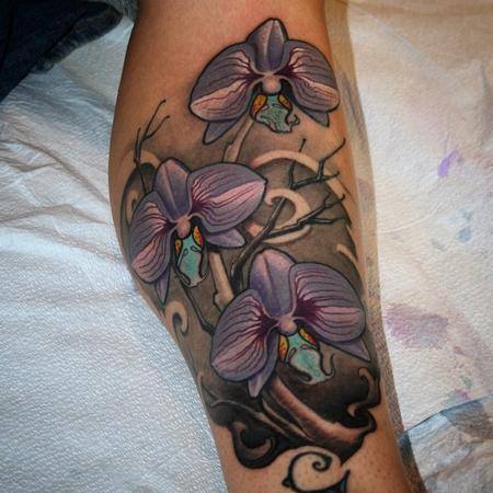 Impressive Flowers Tattoo On Right Leg Calf By Jeff Norton