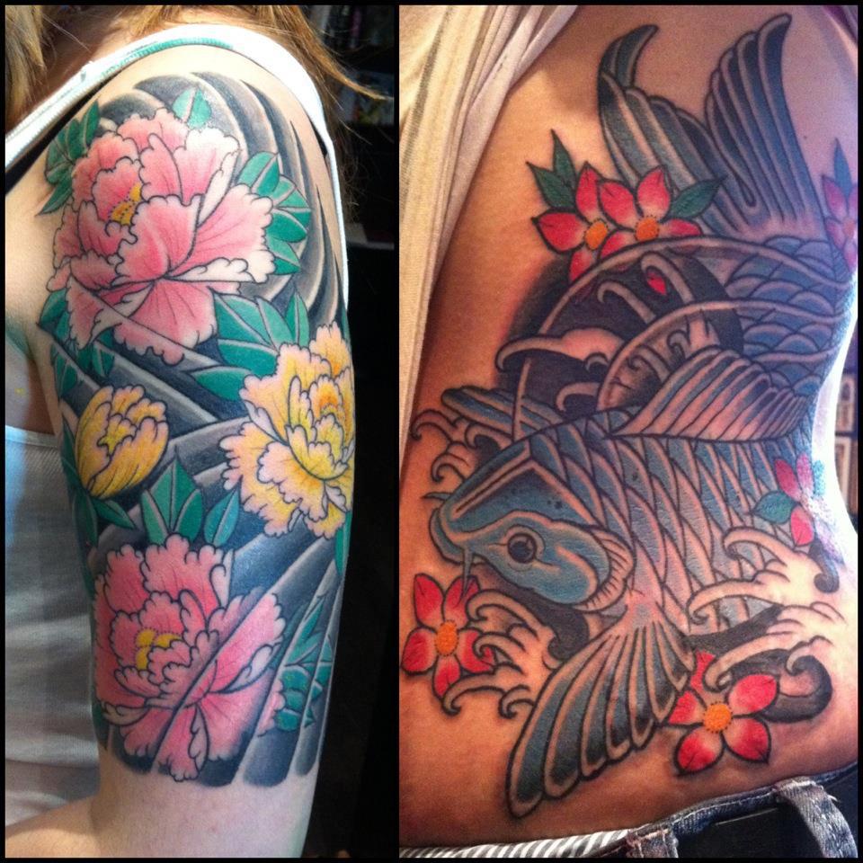 Koi Fish With Flowers Tattoo On Left Side Rib By Joel P Blake