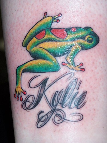 Kylie Frog Tattoo On Arm