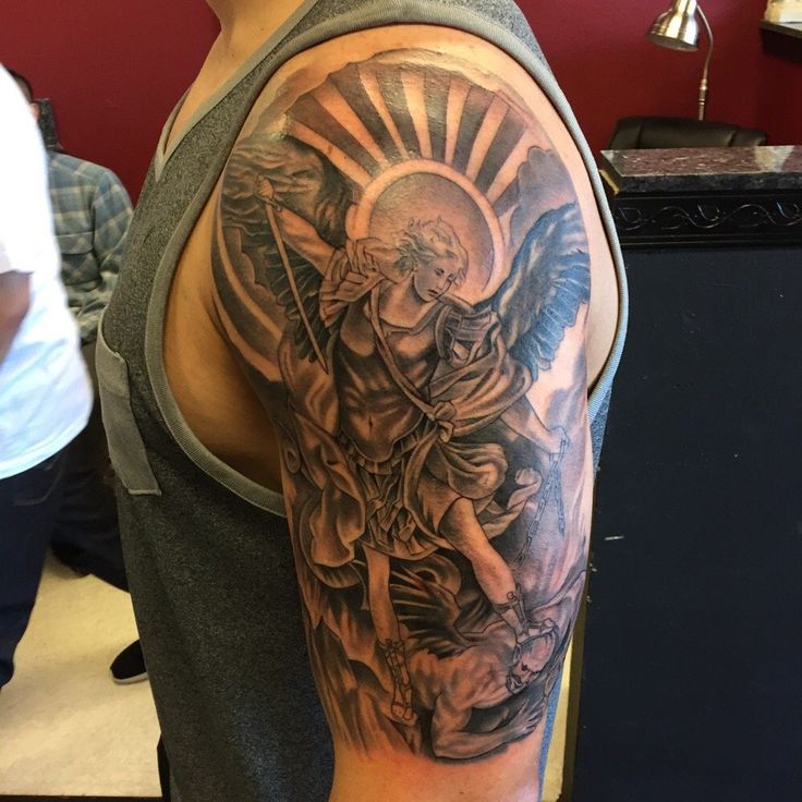 Latest Black Ink Archangel Michael Tattoo On Man Left Half Sleeve