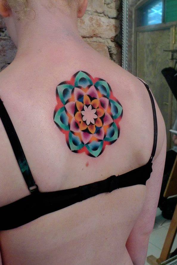Latest Colorful Flower Tattoo On Women Upper Back By Mariusz Trubisz