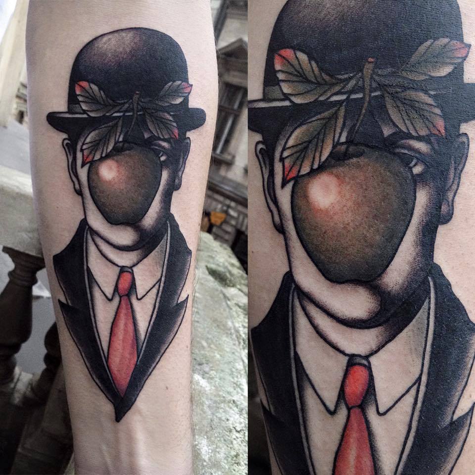 Man Face With Apple Tattoo On Forearm By Marcelina Urbanska