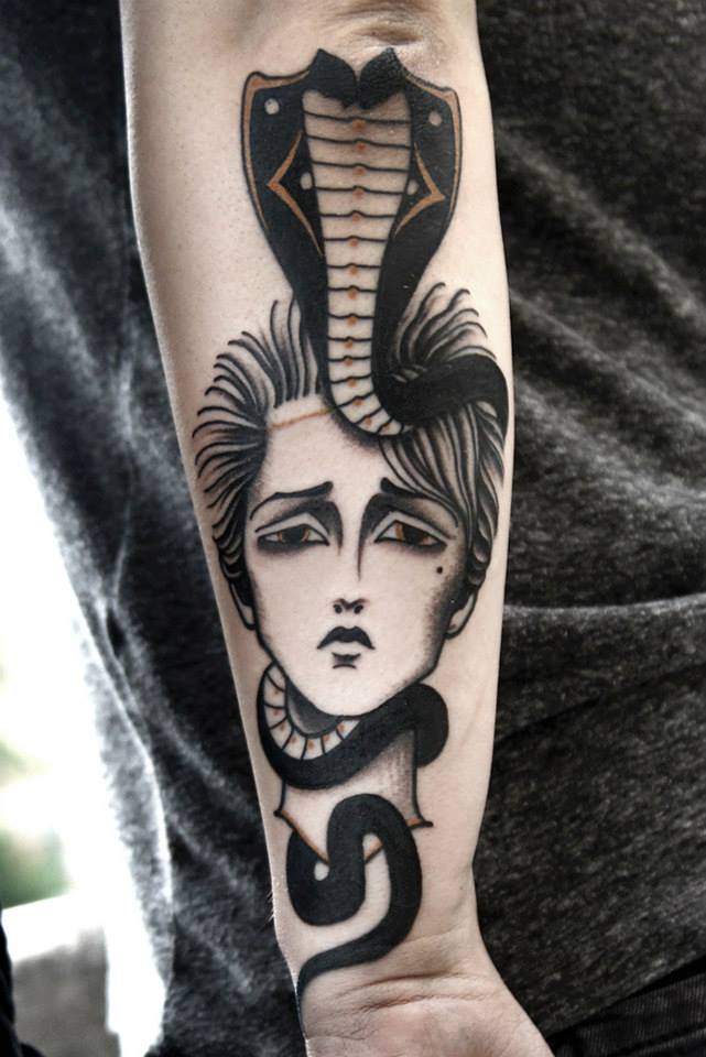 Man Face With Snake Tattoo On Right Forearm By Marcelina Urbanska