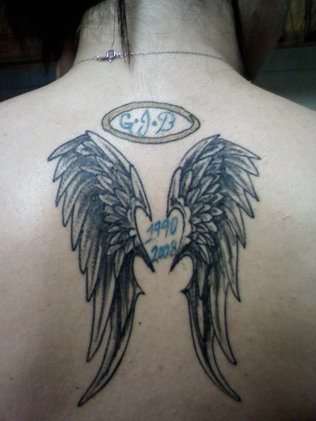 Memorial Angel Wings Tattoo On Upper Back
