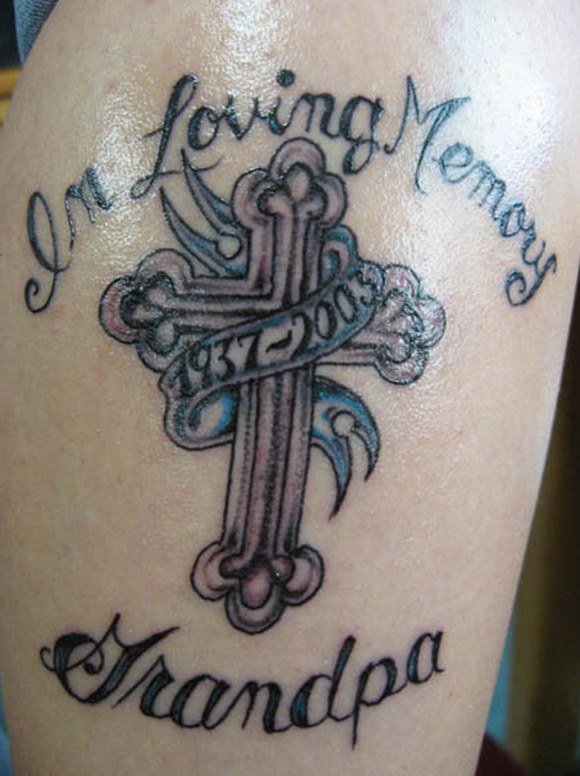 Memorial Banner And Cross Tattoo On Bicep